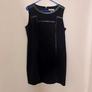 Workwear apparel that is fun and functional. Faux leather accents, great shape!